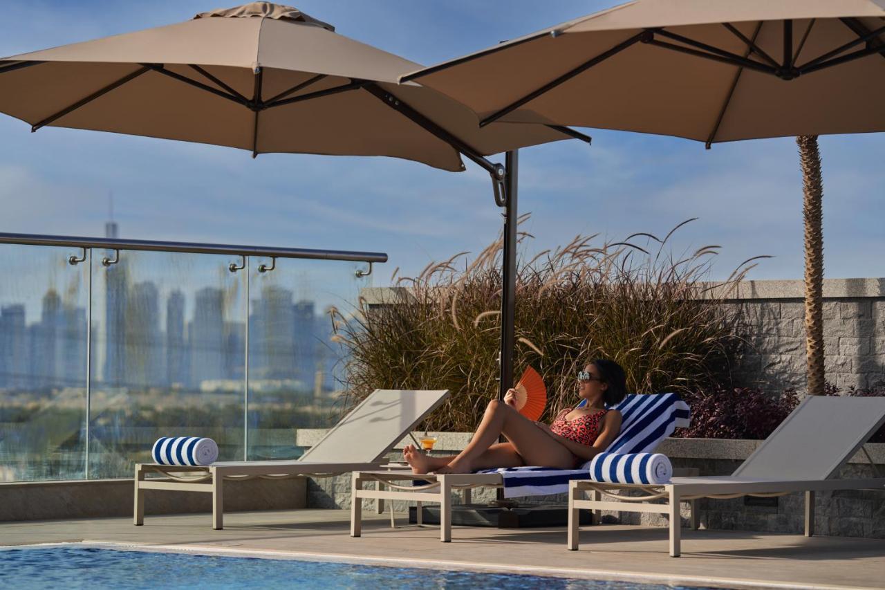 Novotel Jumeirah Village Triangle Dubai Exterior foto